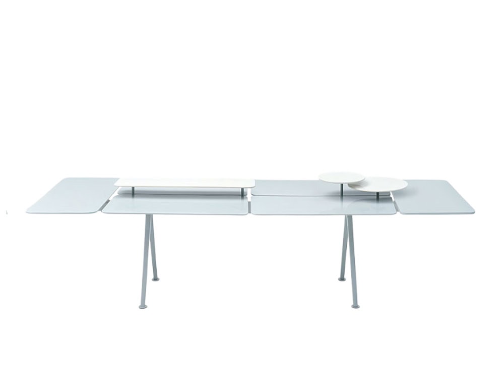 This refined table balances function and style with modular trays and slim legs creating a contemporary piece that adapts beautifully to any setting.