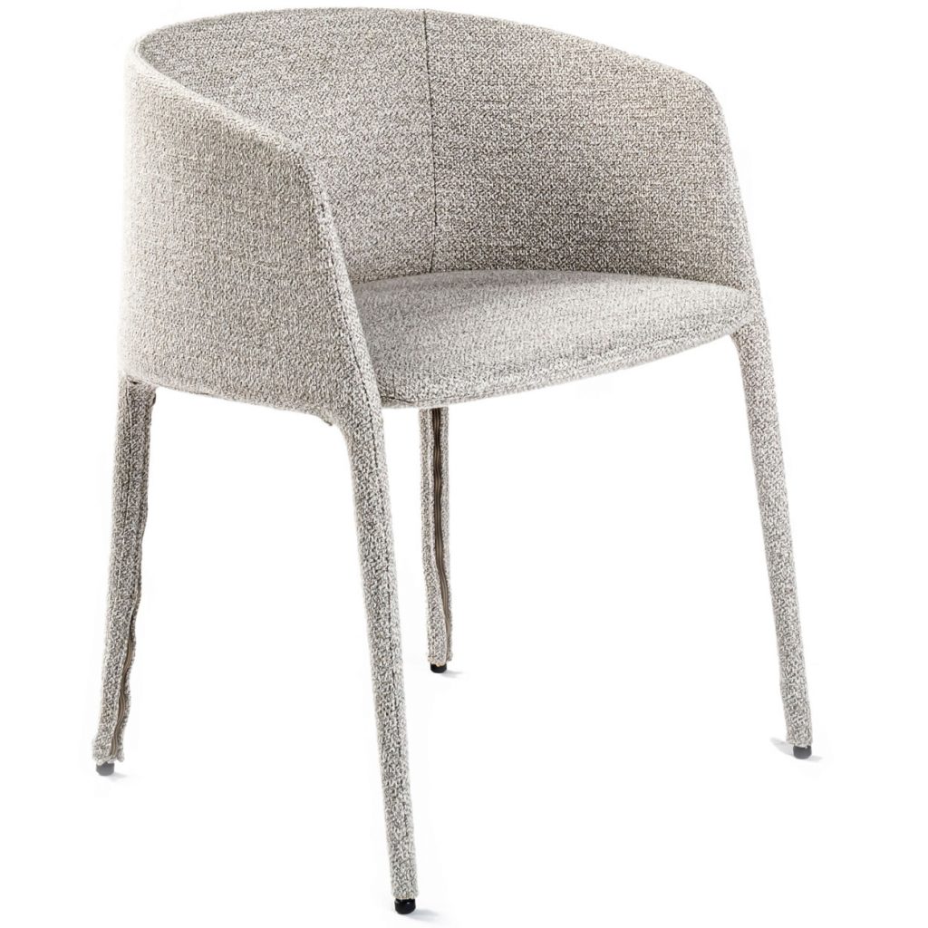 Angled view of Achille chair in front of a white background