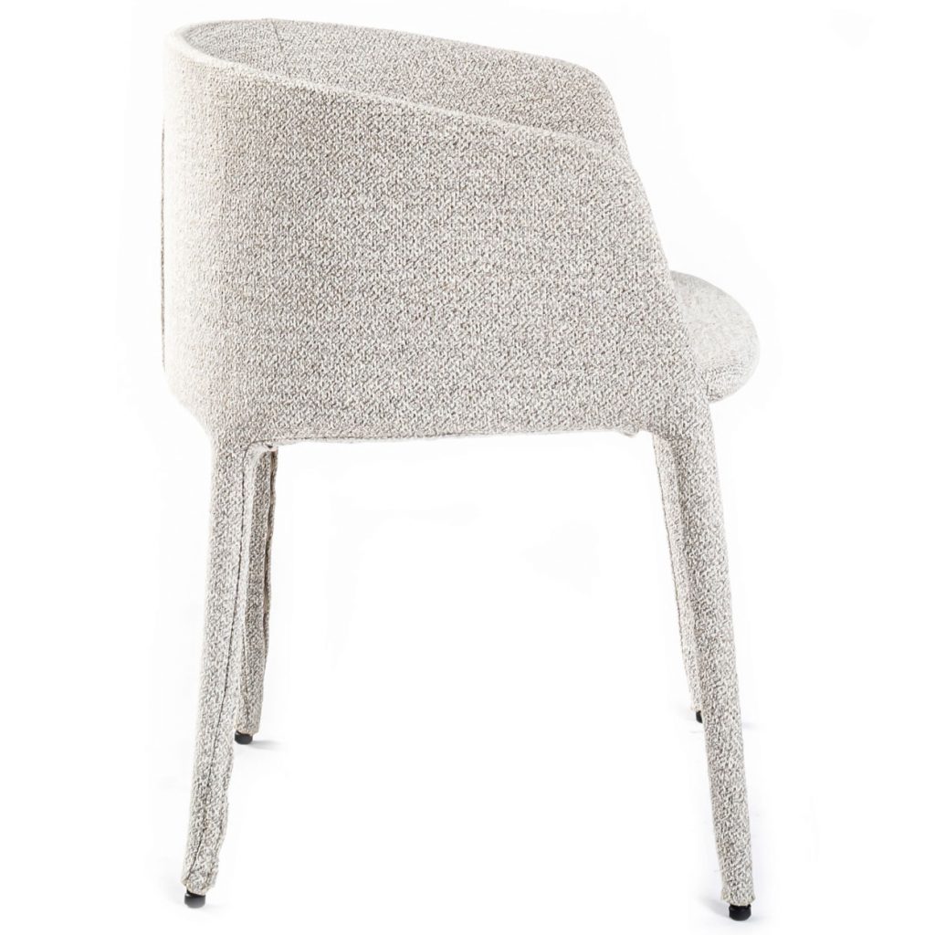 Side view of Achille chair in front of a white background
