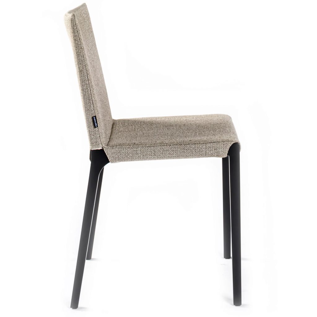 Side view of Ada dining chair in front of a white background