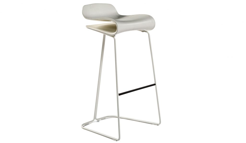 Angled view of BCN counter height barstool in front of a white background