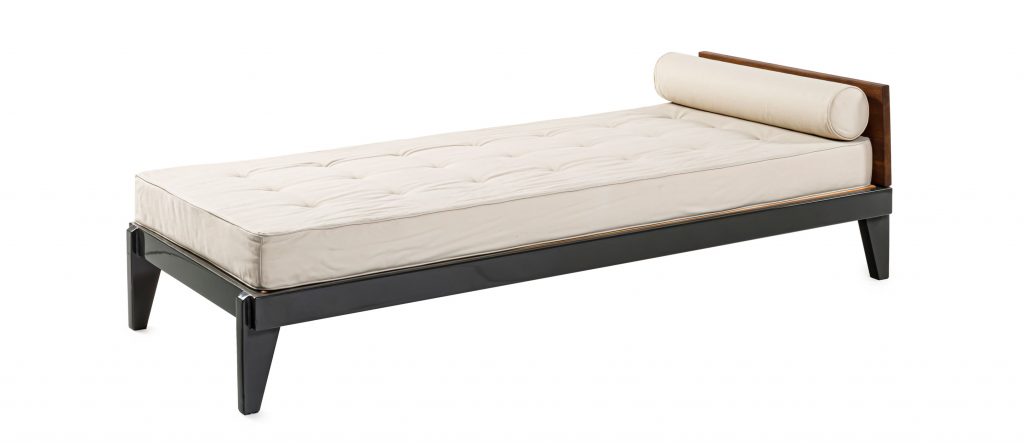 Jean Prouvé Lit Flavigny daybed in front of a white background