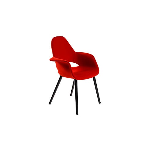 Angled frontal view of Organic chair in red in front of a white background