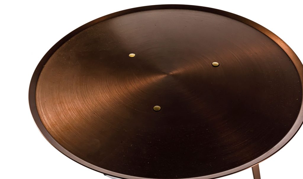 Top close up view of T-Gong side table in front of a white background