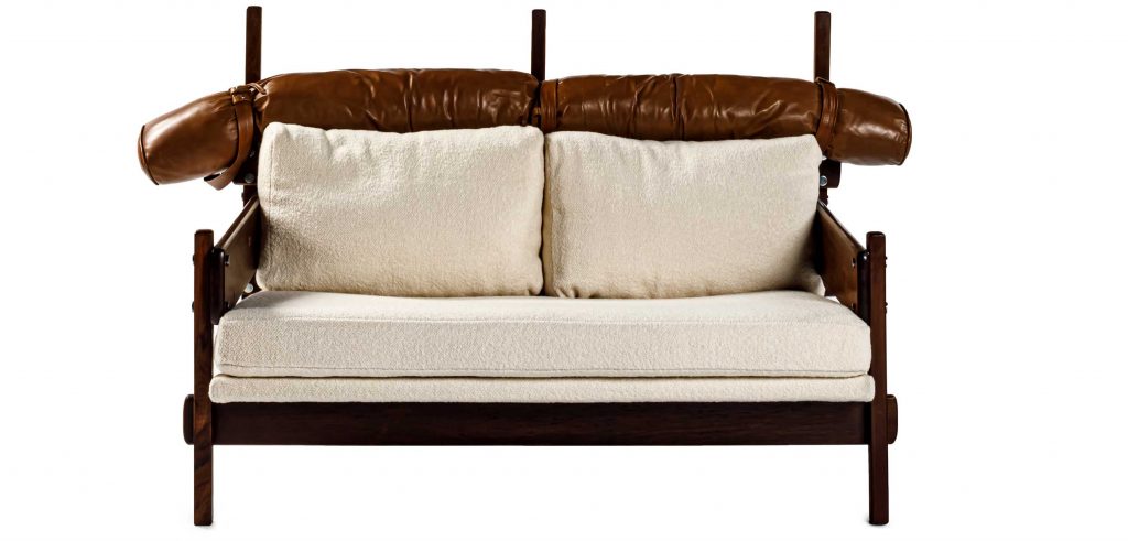 Frontal view of Sergio Rodrigues Tonico Two sofa in front of a white background