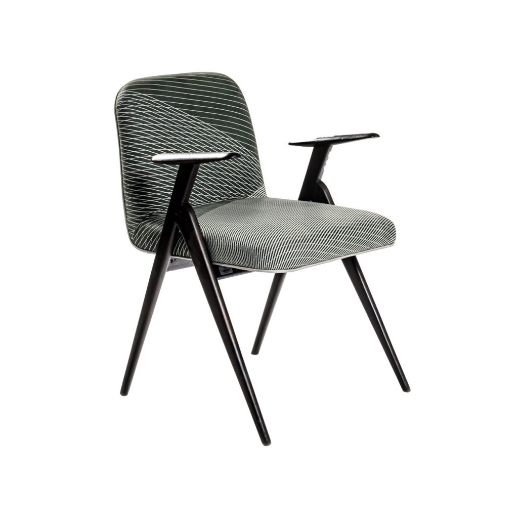 Angled front view of Unique chair in front of a white background