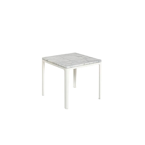 Plate side table in front of a white background