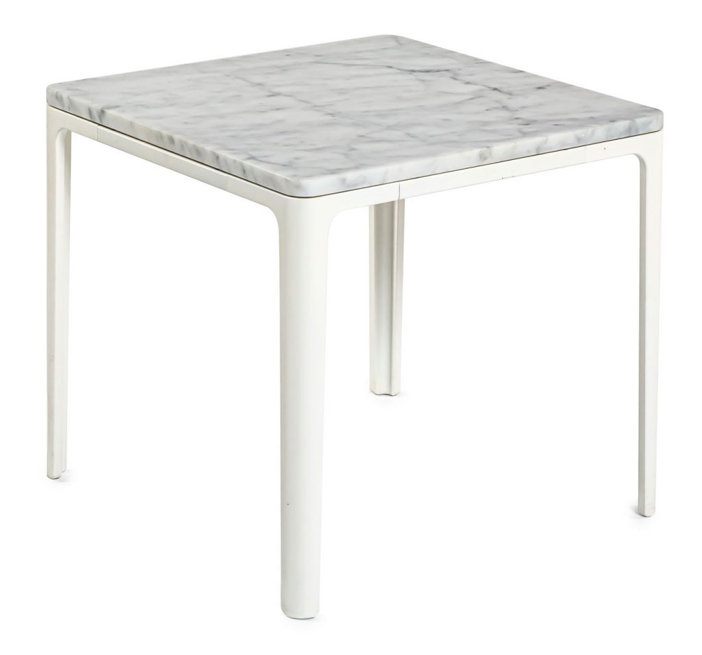 Plate side table in front of a white background