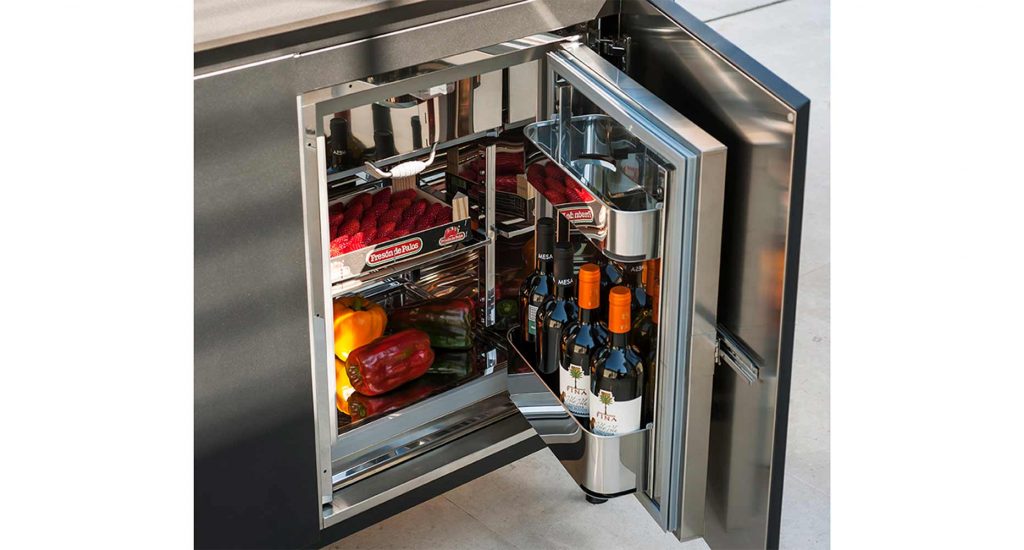 A close-up of the built-in fridge opened on the Norma Two Sink