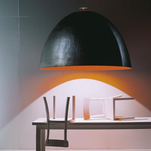 XXL Dome lamp with an orange inside hanging over a table