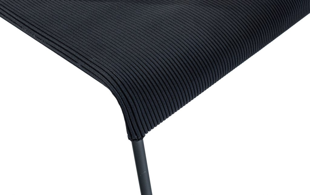Close-up of corner Mira seat and leg in front of a white background