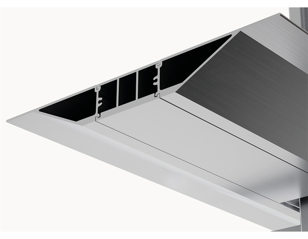 A close-up of the Hypostilo Shelf reveals its precision-engineered aluminum profile with angular cutouts and clean, brushed surfaces, emphasizing structural integrity and minimalist design.