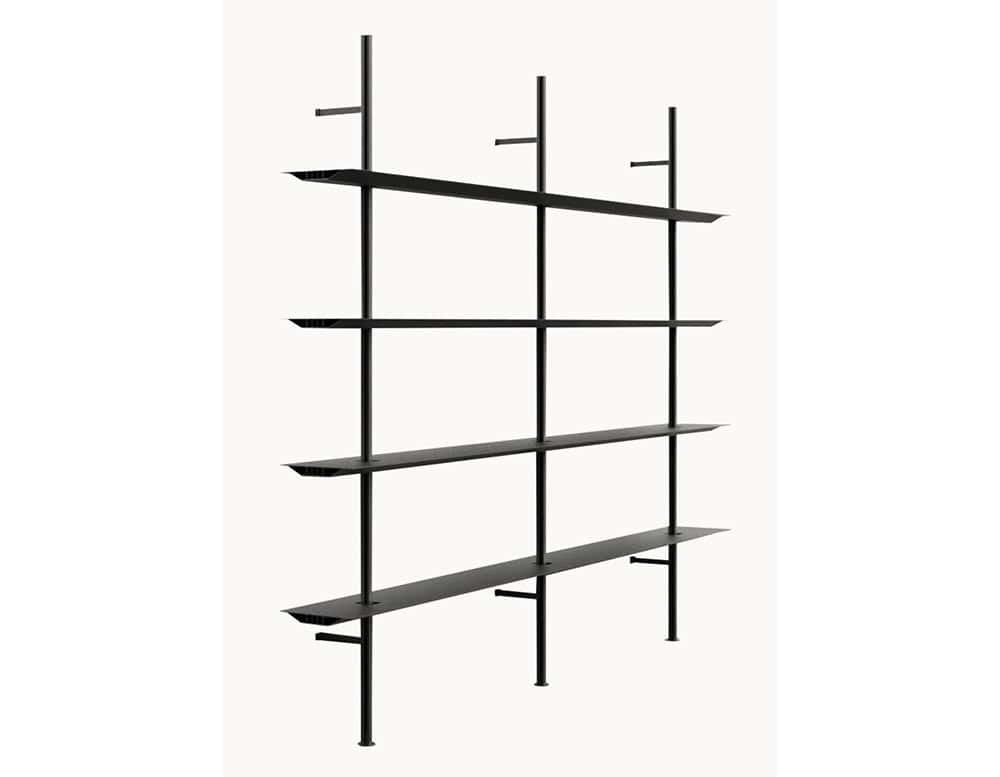 Freestanding modular shelving system made of slim metal components. Its clean vertical supports and horizontal shelves create a lightweight yet sturdy structure.