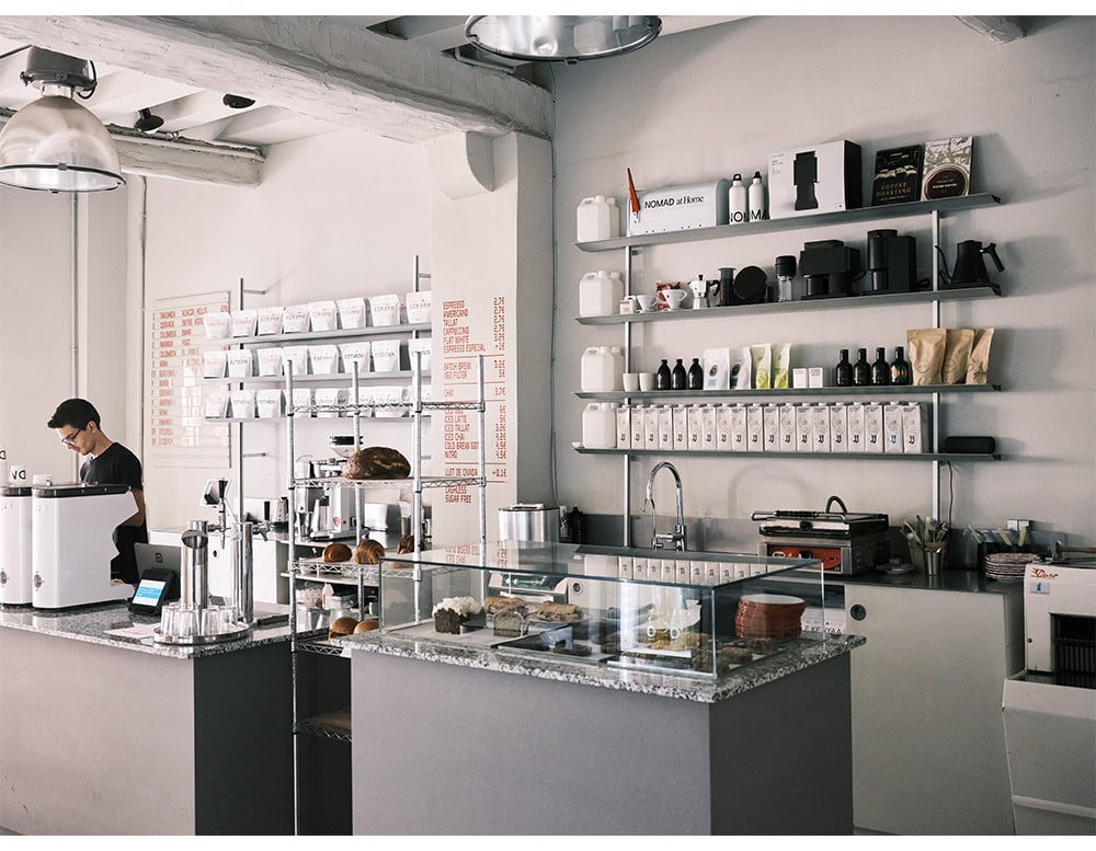 metal wall-mounted shelf with a clean, simple design.