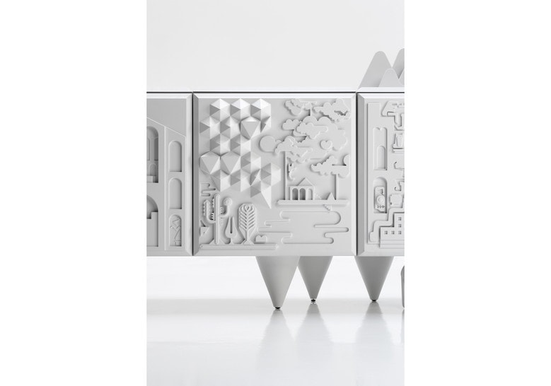 shelf made of a wooden base with a particular design in shades of white, figurine design engraved on its body