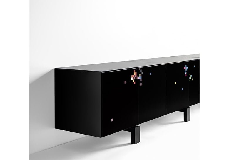 side sideboard made of black wood base in a shiny black tone with green, pink and white finishes