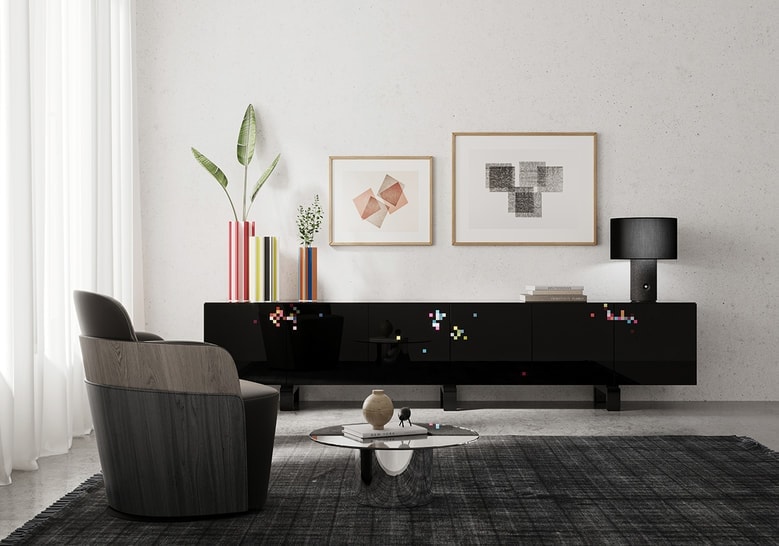 side sideboard made of black wood base in a shiny black tone with green, pink and white finishes on a living room