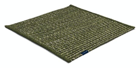 rugs made of hand-woven and braided fabric in a dark green tone