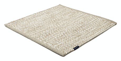 rugs made of hand-woven and braided fabric in a gray tone