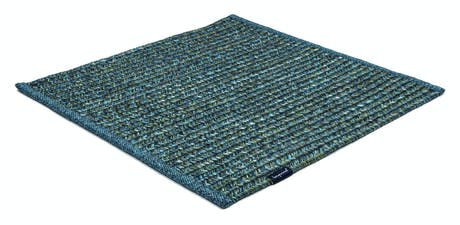 rugs made of hand-woven and braided fabric in a azul tone