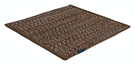 rugs made of hand-woven and braided fabric in a brown tone