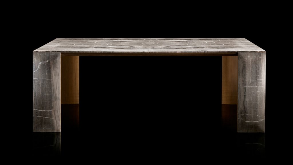 Rectangle LY Table. four rectangle legs and top in natural wood covered with silver steel on a black background.