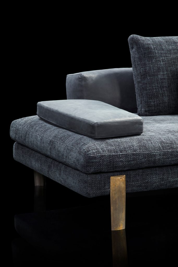 sofa cushion made of polyurethane foam and upholstered in blue fabric and with a gold steel base