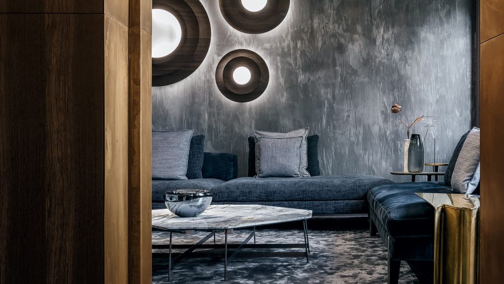 sofa made of steel metal base and upholstered in fabric in a blue tone