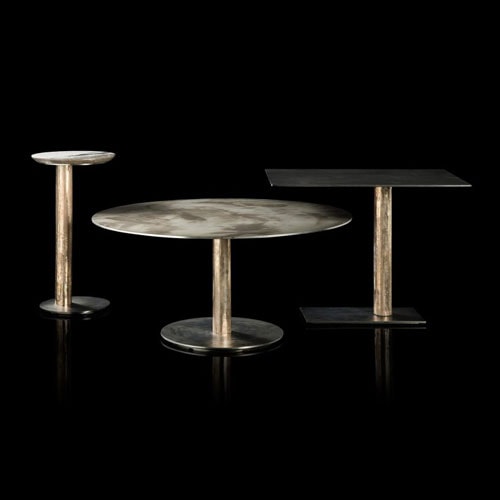 Three Twistable Coffe Table And Consolles. Black structure support, platinum central leg and a top in gray and white stone, one in silver and the other in black on a black background.