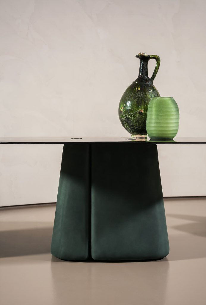 centerpiece with green glass top and an emerald base