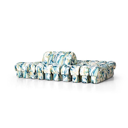 Modular seats with an explosion of white, various blues, green and yellow colors behind a white background