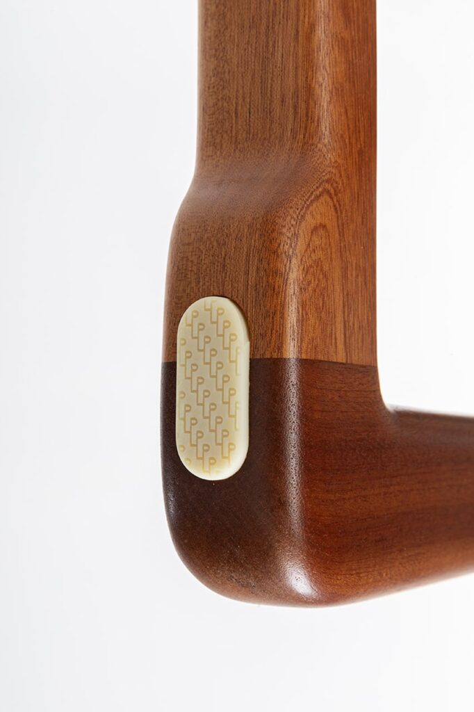 chair with button implemented to disassemble the stool around wood