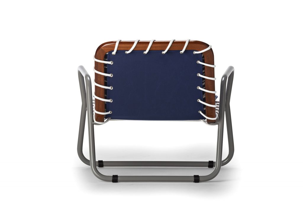 small chair with blue and white rope woven through brown wood, anchored by an aluminum frame.