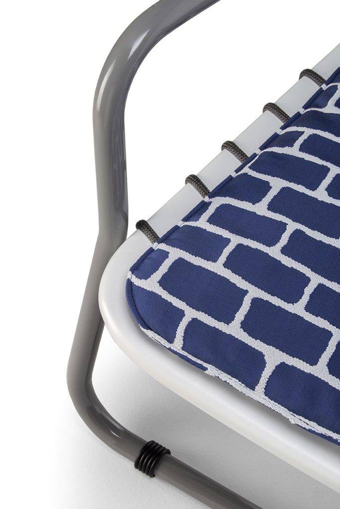 chair with blue and white rope finishes on a white background