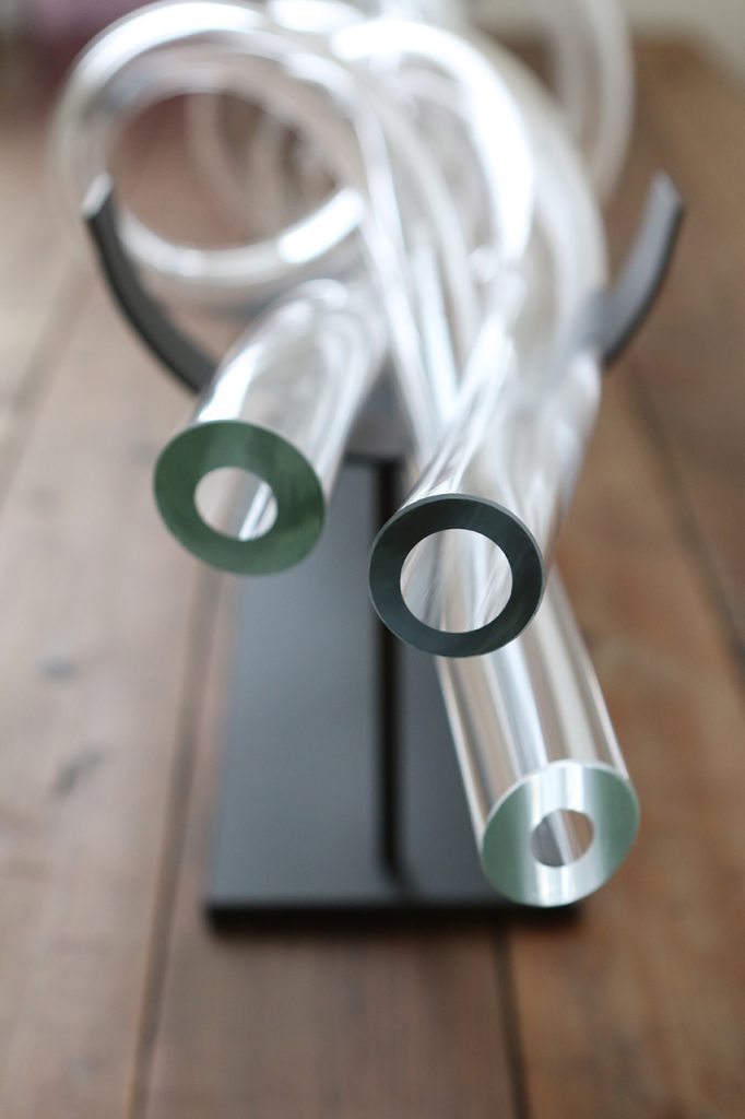 blown glass tubes with openings on the sides to see natural lighting.