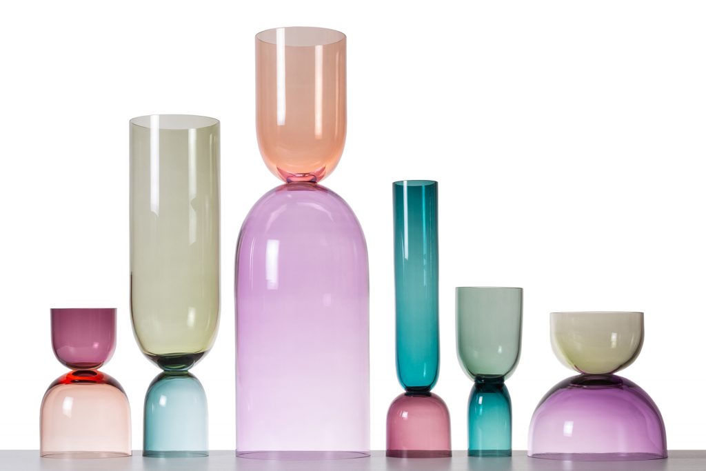 curved glass glasses with different color palettes on a white background.
