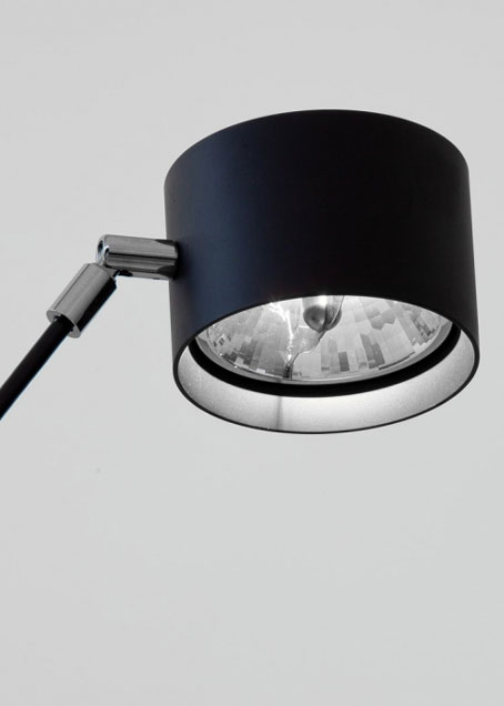 Floor lamp in matte black American version with warm 2700K lighting.