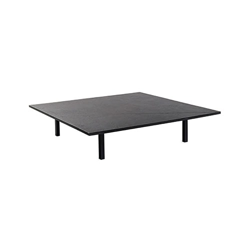 Exclusive matte black wooden coffee table restored by Draga & Aurel to a white background.