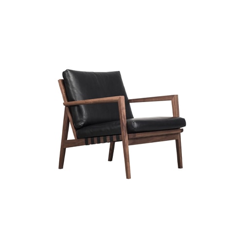 Armchair made of black fabric or leather with base made of brown oak or ash wood
