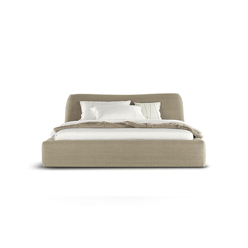 Warm and enveloping bed with soft, curved lines.