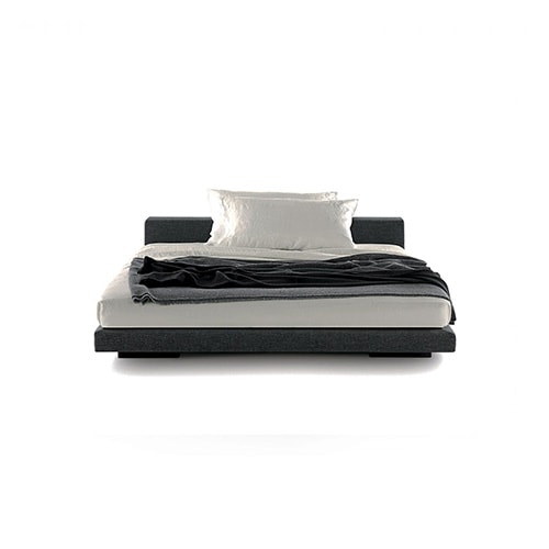 bed made of brass and upholstered throughout its structure with gray and black leather on a white background