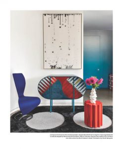 This image features a vibrant and modern interior space with colorful furniture and decor. Let me know if you need any modifications, descriptions, or additional information.