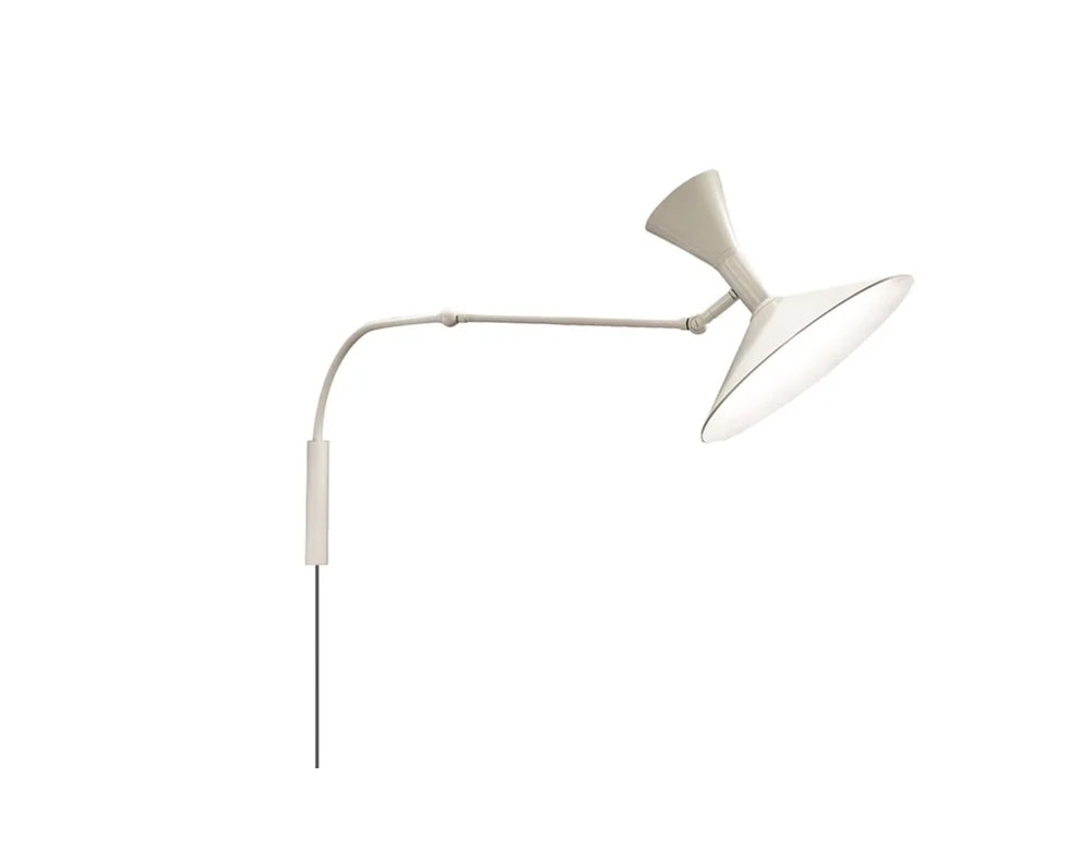 Modifiable arm lamp made of white metal on a white background