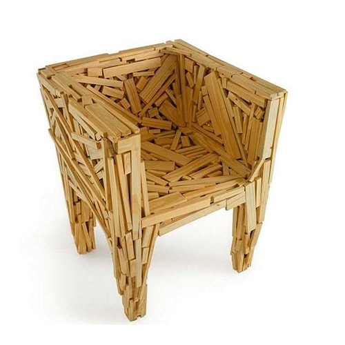 chair made with several pieces of different wood with an imperfect design and a brown color tone