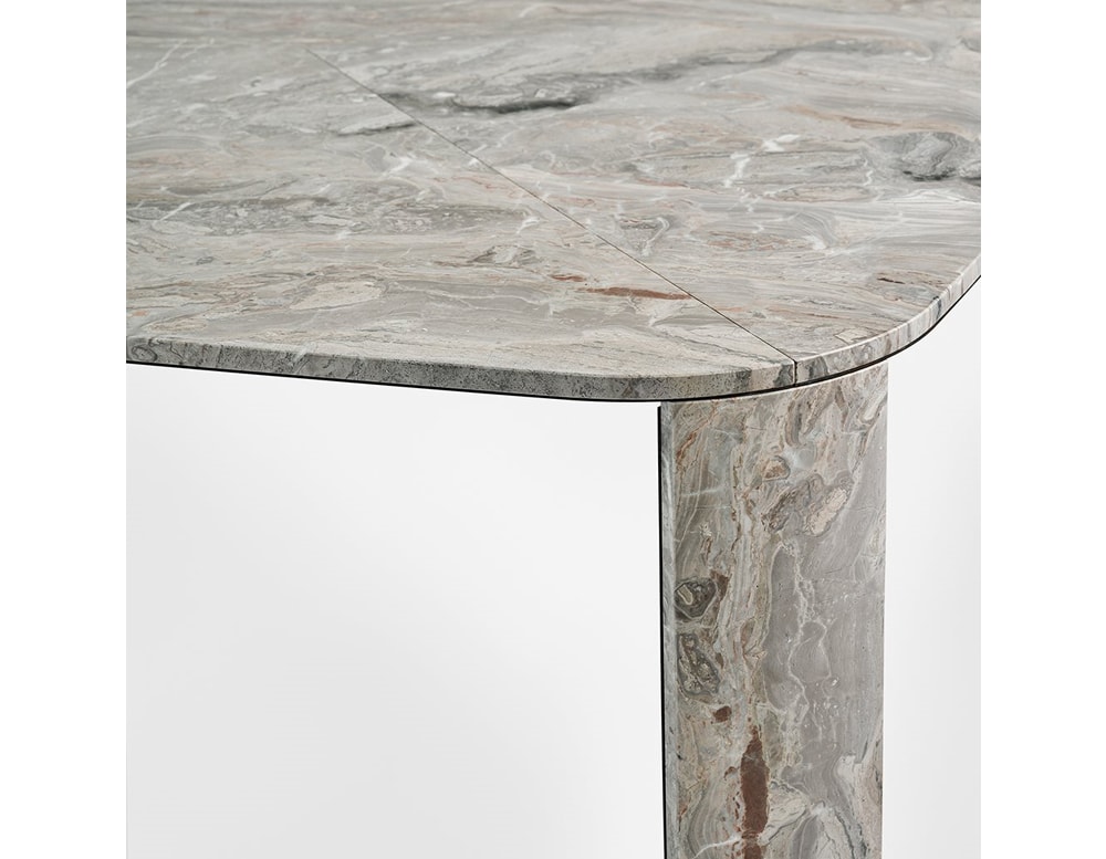 Close up of Clemo table marble leg in front of a white background