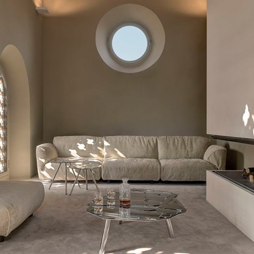 Luxurious white plush sofa, exuding elegance and comfort.