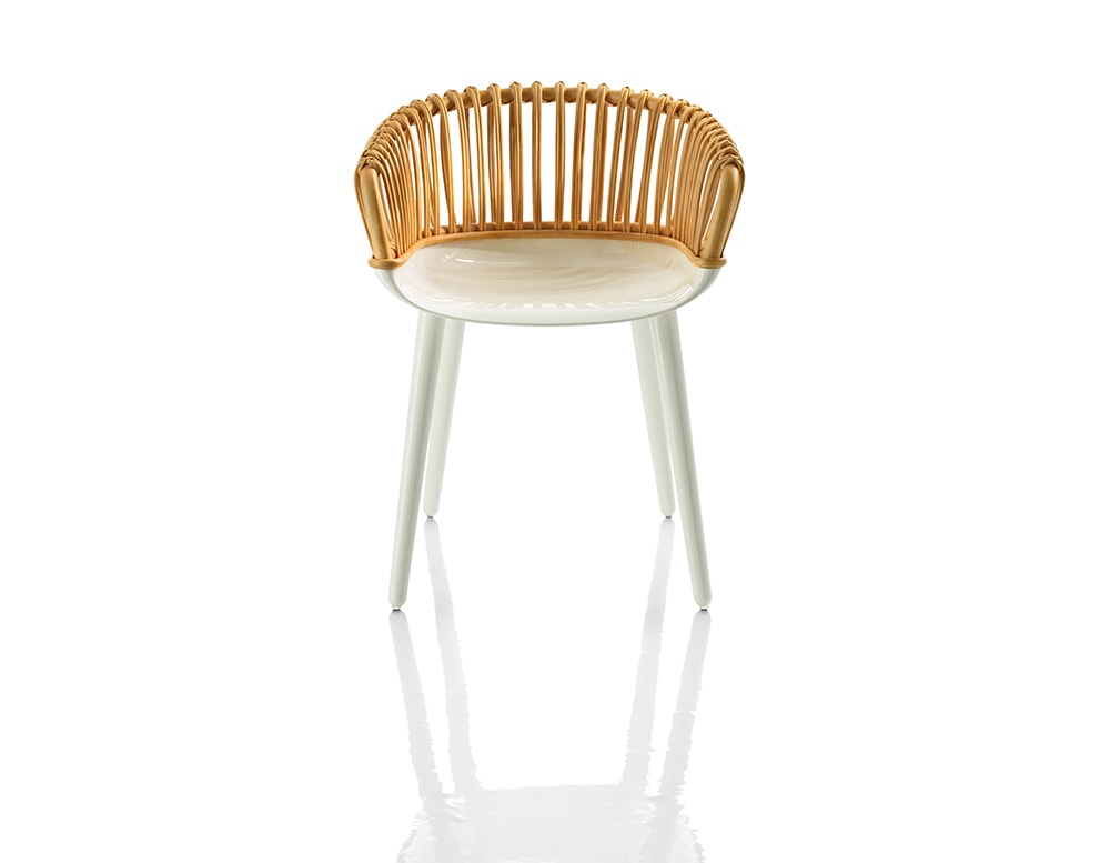 Armchair made of polycarbonate in shades of white and light brown with openings in its backrest in a white background