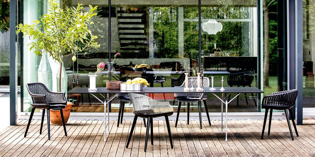 dining chairs made of polycarbonate with a backrest in imperfect finishes in black color tone