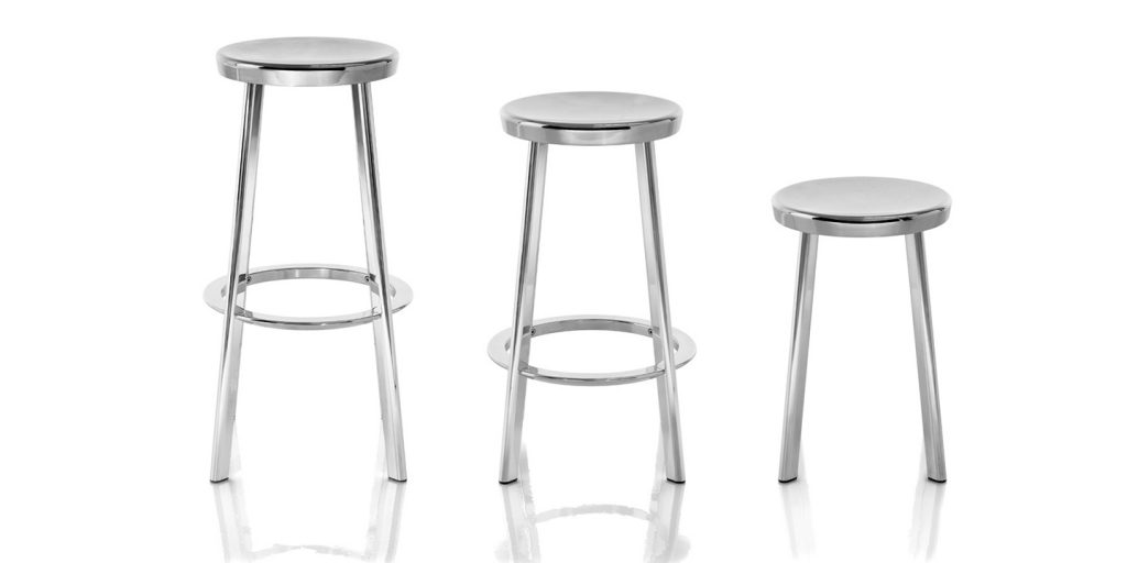 stools made of aluminum in their structure lacquered in shades of silver ina white background