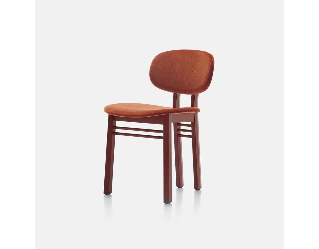 chair upholstered with fabric and shiny finishes in orange tone with ash wood base in a dark brown tone in a white background